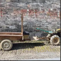Old farm trailer and equipment still in everyday use.